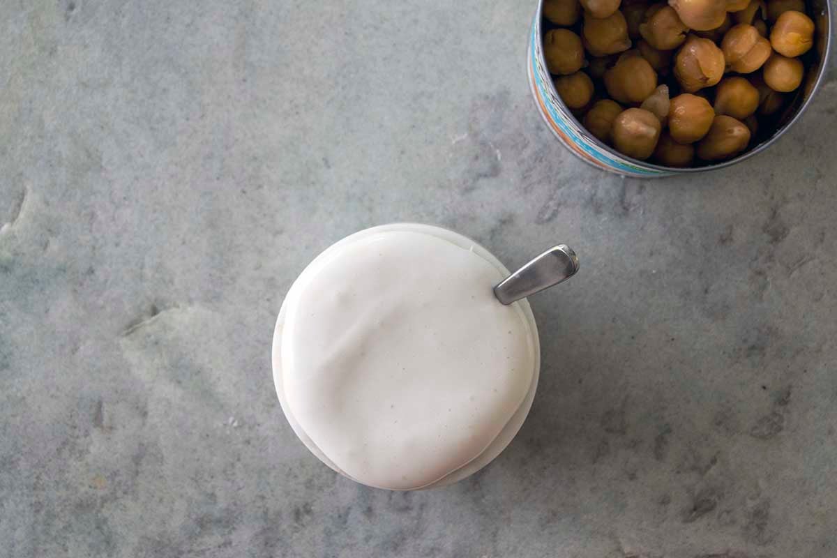 Aquafaba marshmallow spread and opened can of chickpeas