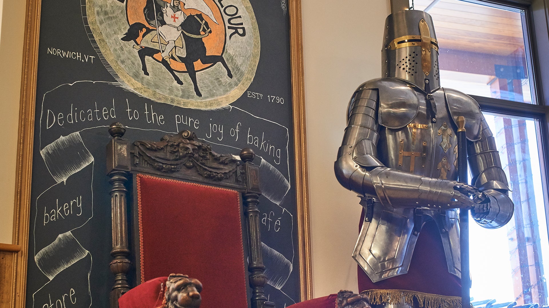 A throne and suit of armor from the King Arthur Flour cafe
