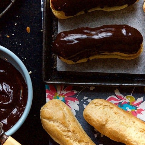 Eclairs being iced - select to zoom