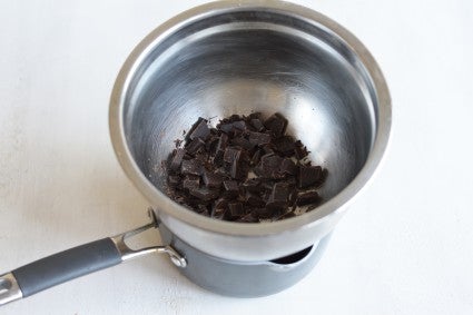 Chopped chocolate in a double boiler