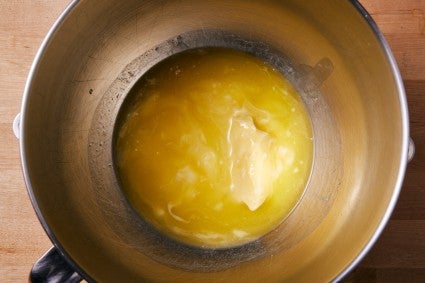 Half melted butter in a stand mixer bowl
