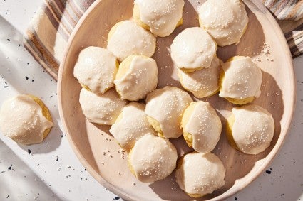 Glazed ricotta cookies on a serving plate