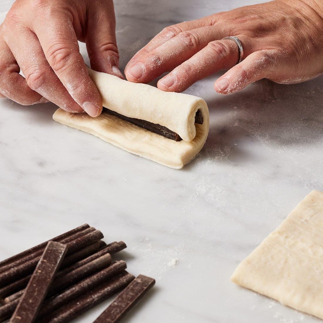 Rolling dough for pan de chocolat