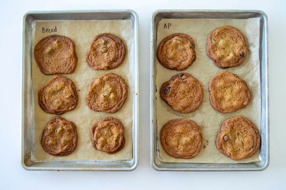 Two pans, one with bread flour chocolate chip cookies and one with all-purpose