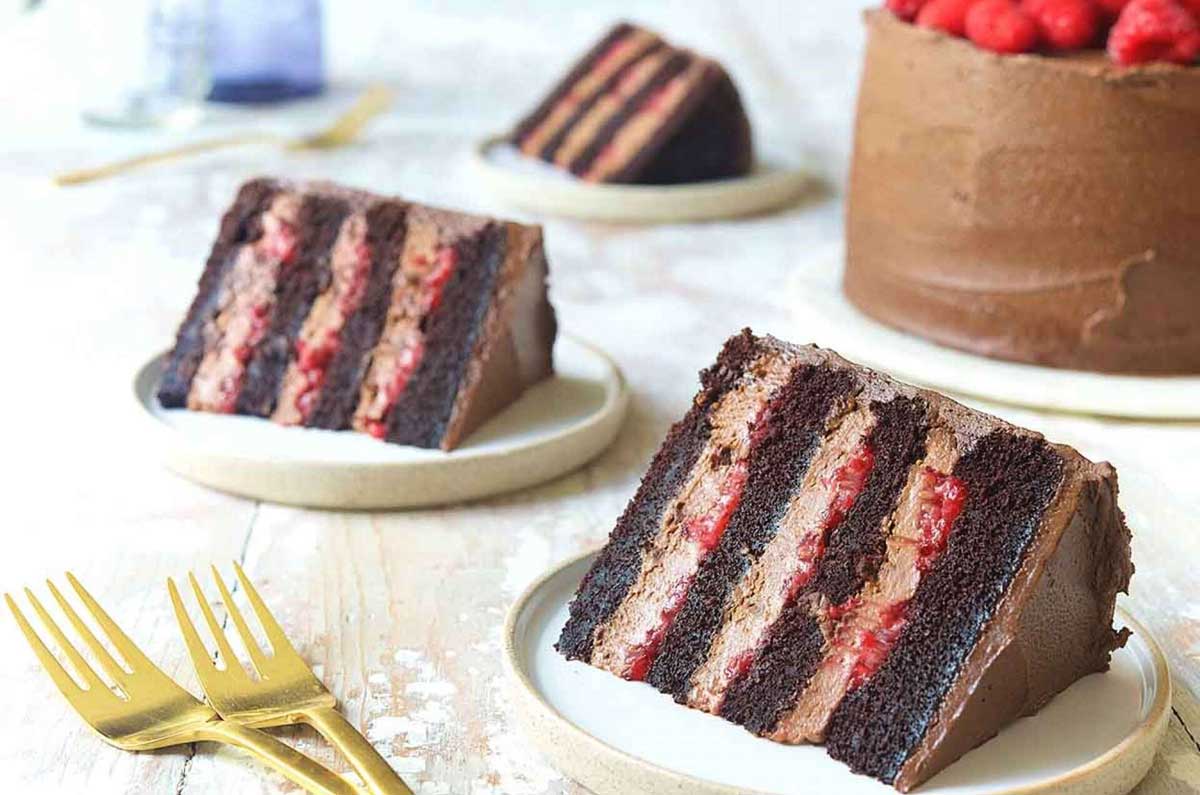 Plated slices of chocolate raspberry cake 