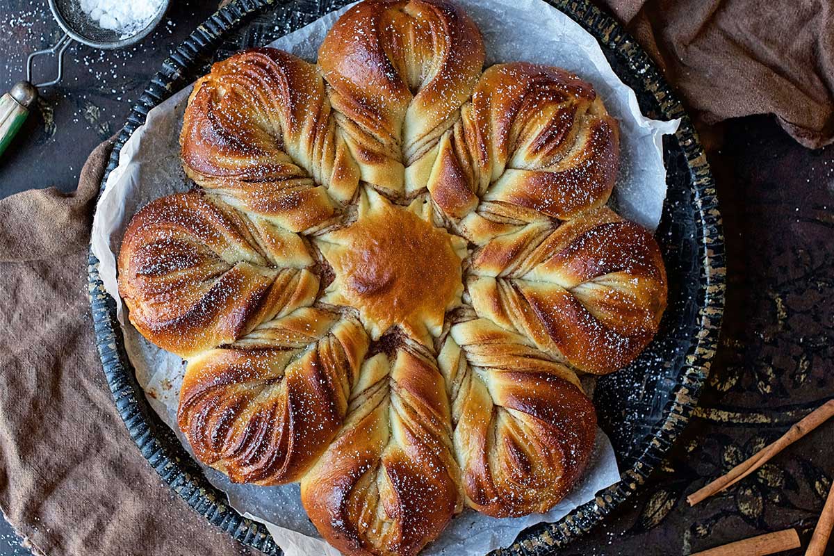 A baked cinnamon star bread filled with cinnamon-sugar