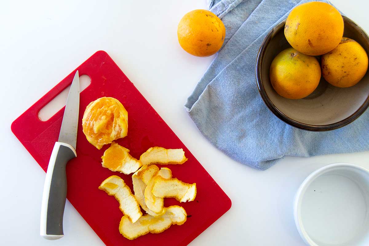 Slices of orange peels on a cutting board