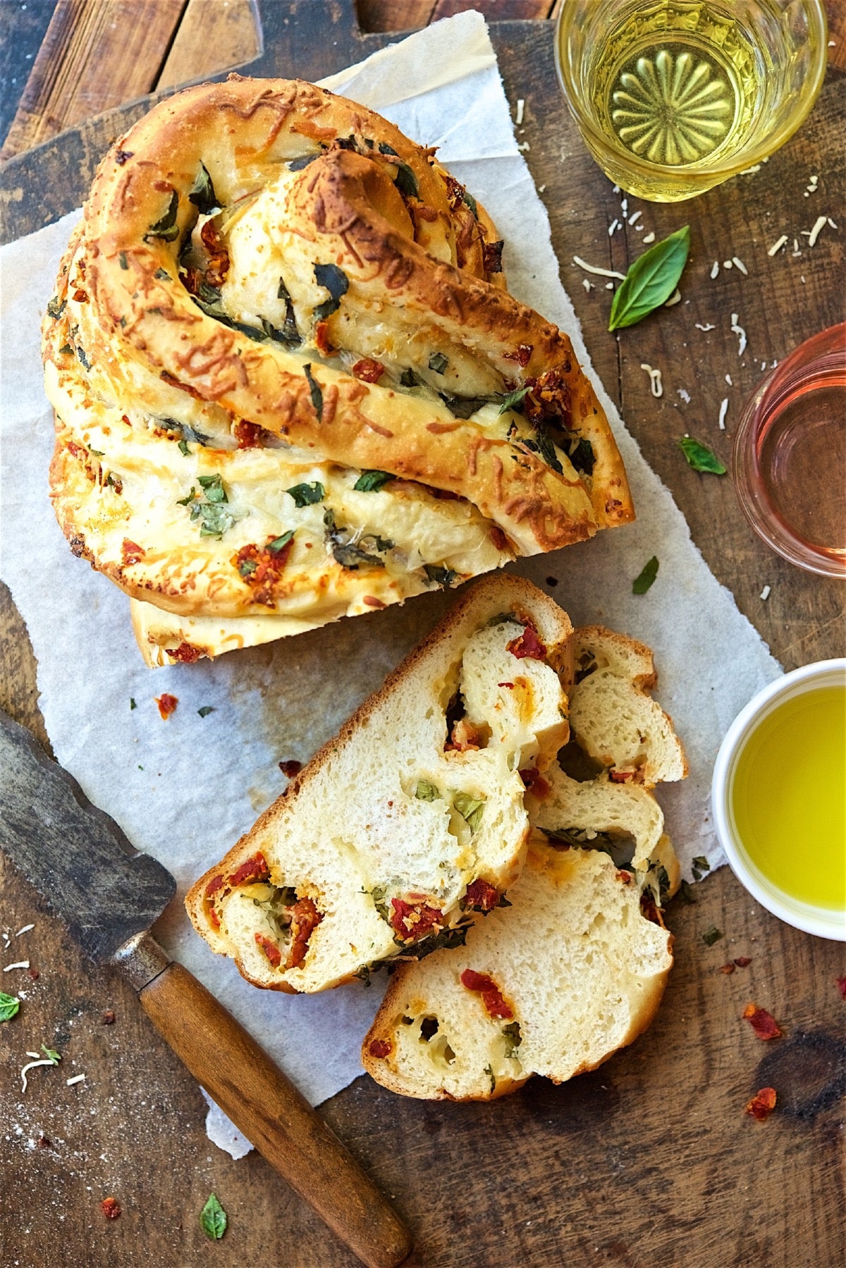 Pane Bianco, a filled. twisted bread stuffed with roasted tomatoes, cheese, garlic, and basil.