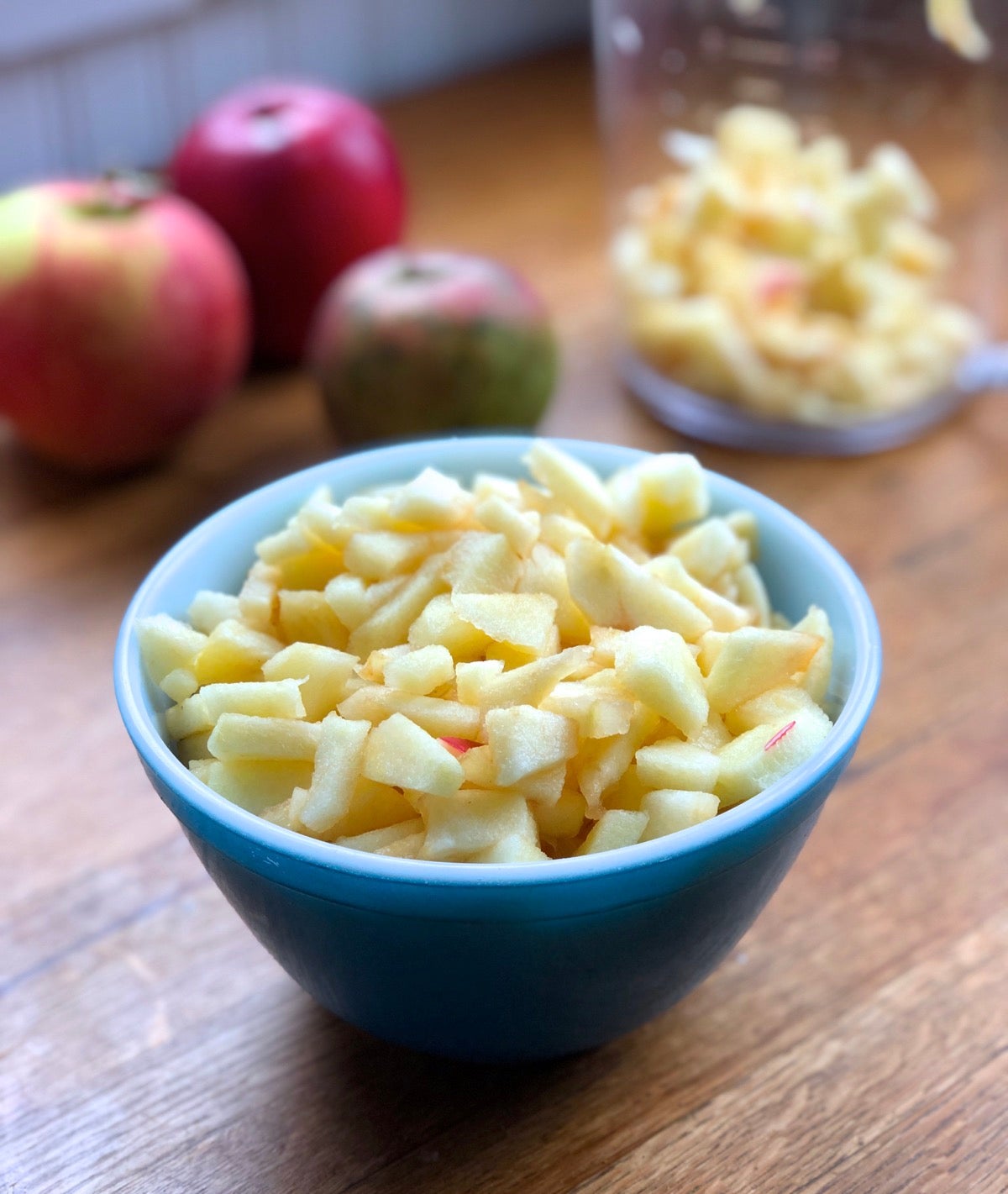Bowl of diced apples ready to be made into apple pie filling.