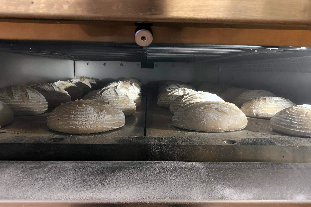 Dough in an oven at the King Arthur Flour Baking School at the Bread Lab