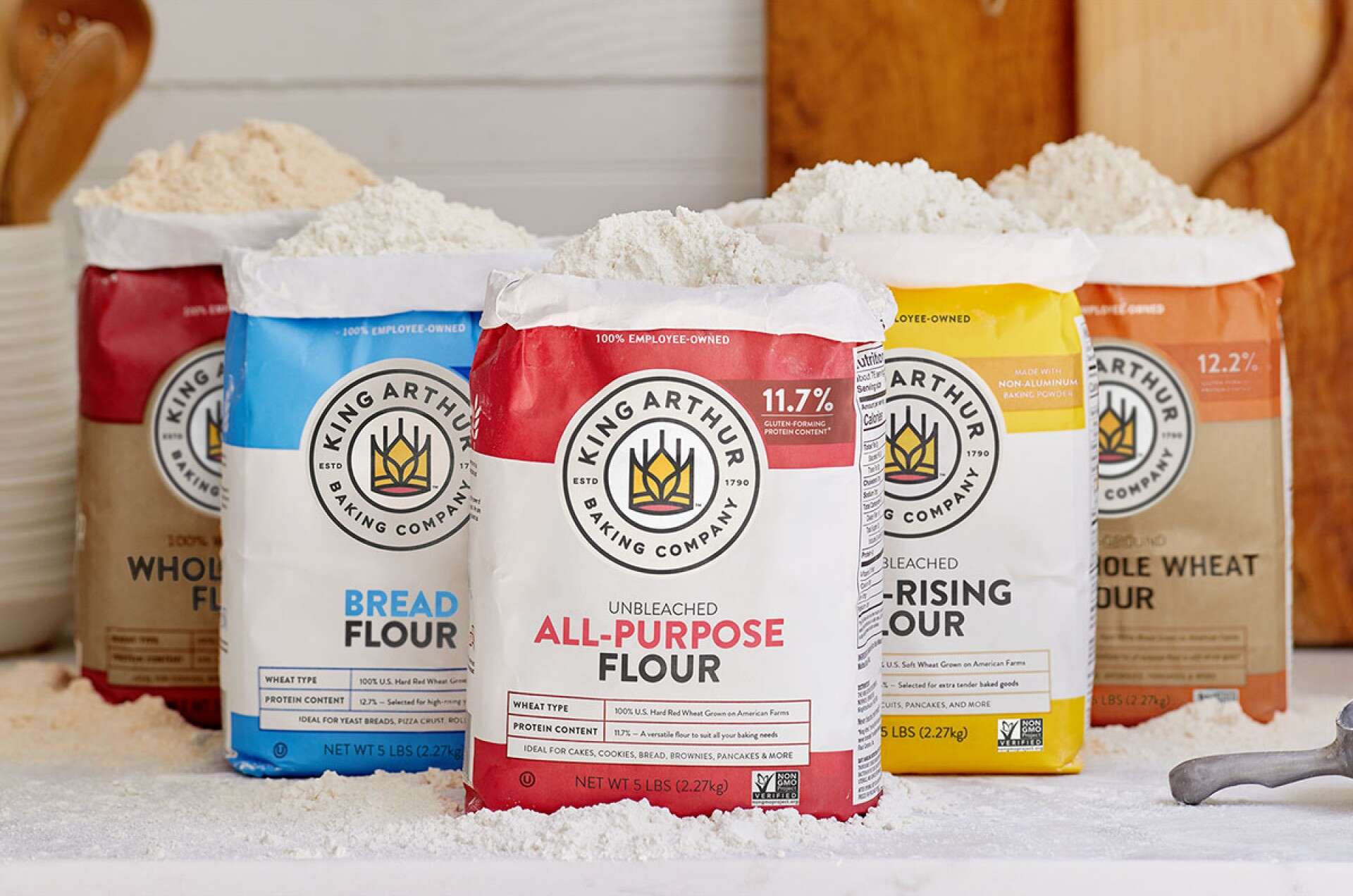 Bags of King Arthur flour featuring the new King Arthur Baking Company logo