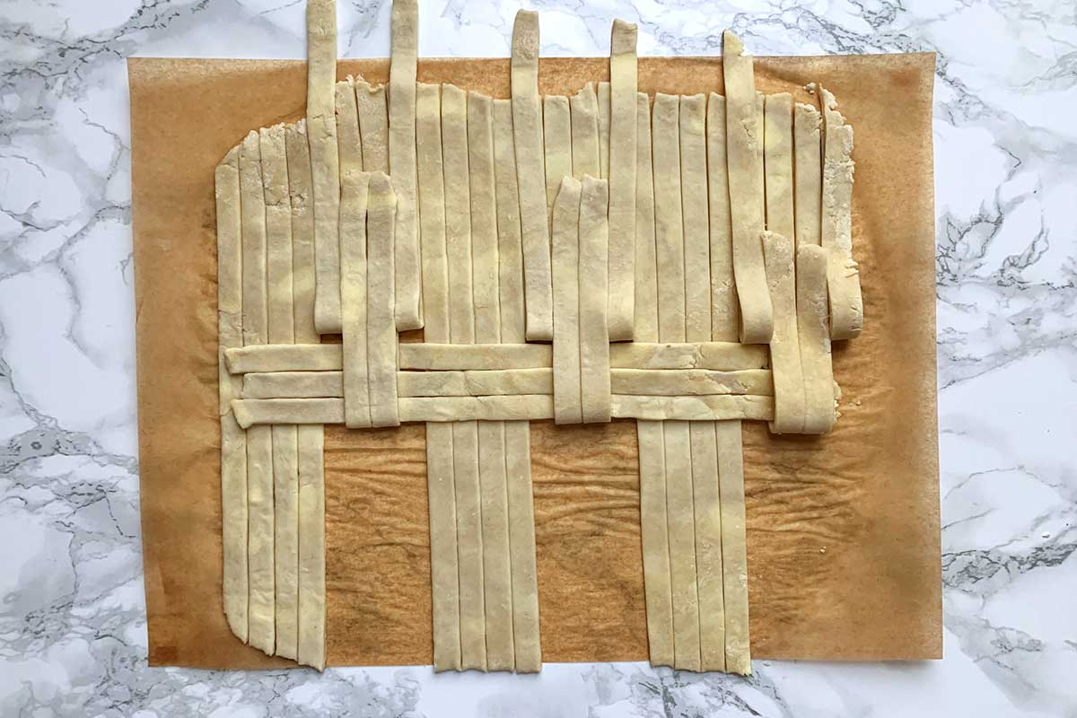Same dough as previous image, with unfolded vertical strips folded back over two horizontal strips