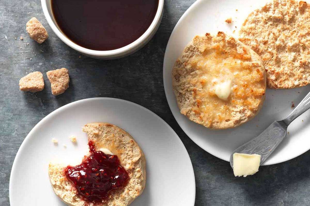 Split and buttered English Muffins with jam