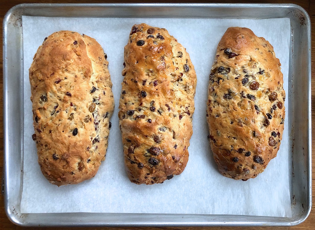 Hot  stollen on a baking sheet, fresh from the oven.
