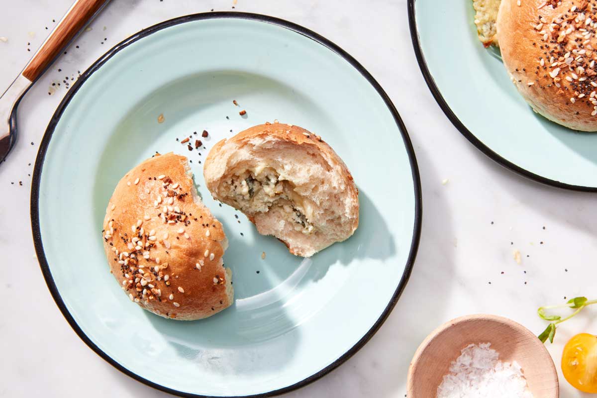 Bagel bun with herb filling visible