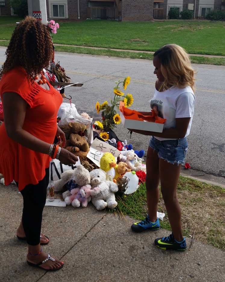 Rose with young woman at Michael Brown memorial