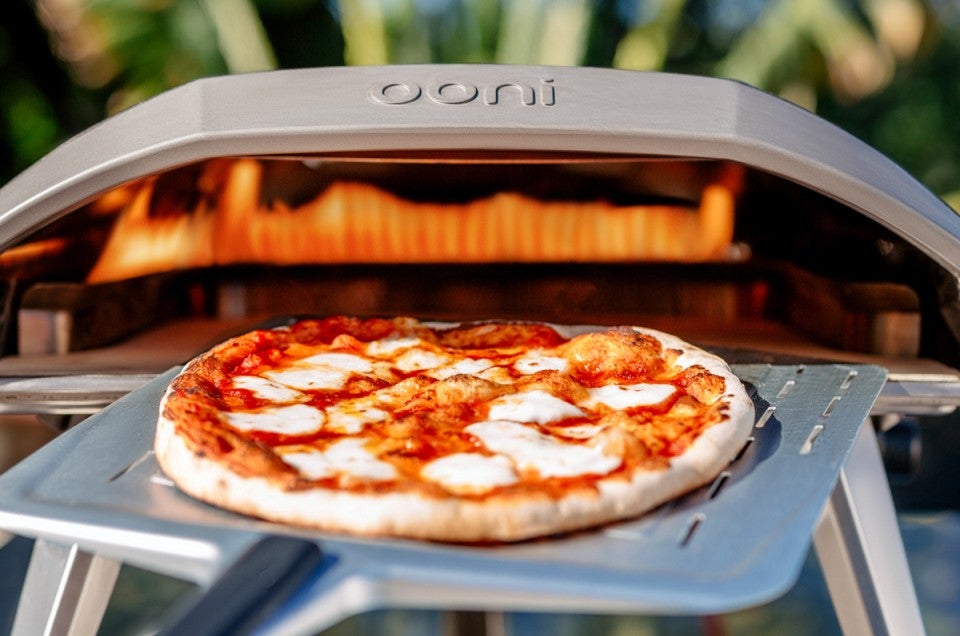 Pizza baking in Ooni oven