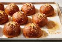 Baked Pretzel Buns on baking sheet