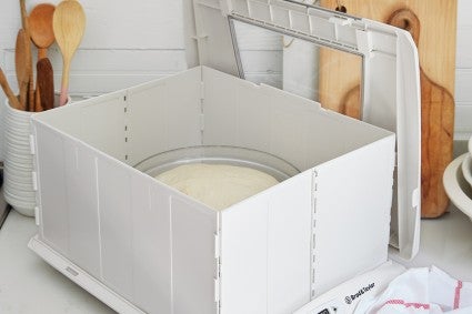 Bread proofer with lid off to show dough 