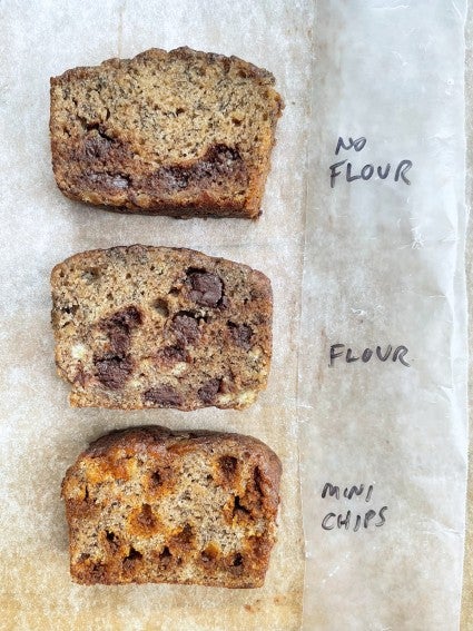 Three slices of banana bread showing the difference between using floured chocolate chips, unfloured chocolate chips, and mini chips.
