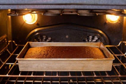 Chocolate cake baking in the oven