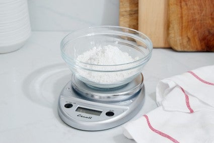 Scale with bowl of dry ingredients on top