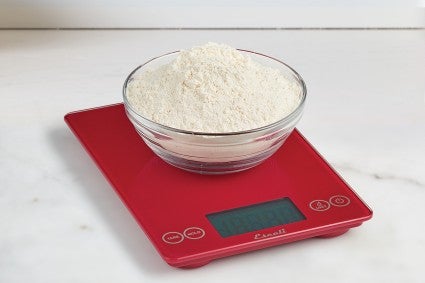 Bowl of flour on red digital scale