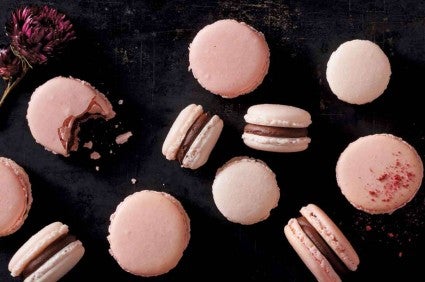 French macaron cookies sandwiched around a rich chocolate ganache filling.