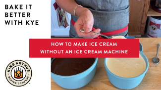 Hand scooping homemade vanilla ice cream